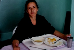 Frau in einer Suppenküche, Ciudad Bolivar, Kolumbien